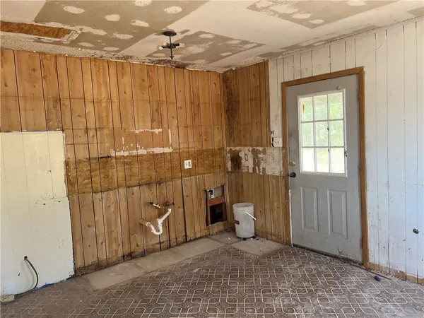 a view of a bathroom with a shower and a sink