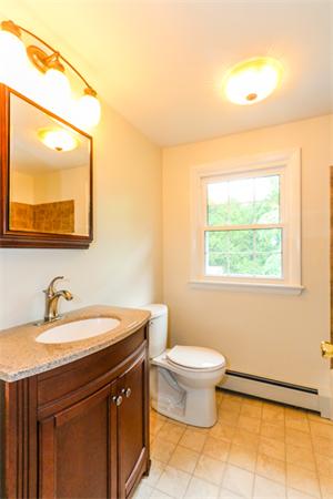 13 Scenna Road Beverly, MA 01915 - Photo 12 of 23 a bathroom with a sink and a toilet
