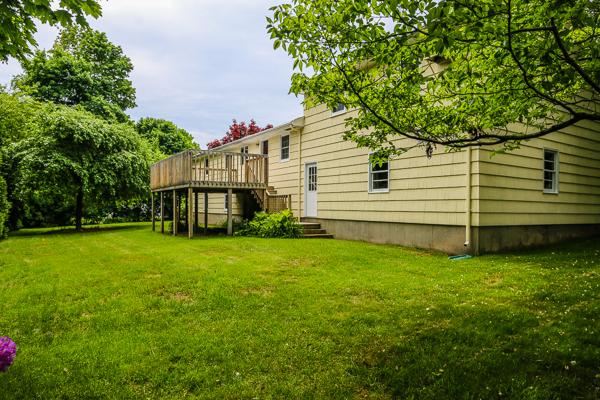 13 Scenna Road Beverly, MA 01915 - Photo 23 of 23 a view of a house with a backyard