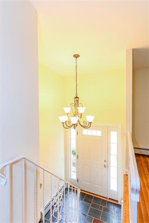 13 Scenna Road Beverly, MA 01915 - Photo 9 of 23 a view of a hallway with wooden floor