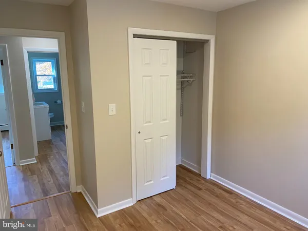 an empty room and wooden floor