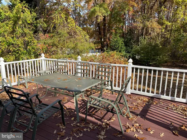 a view of balcony with wooden floor