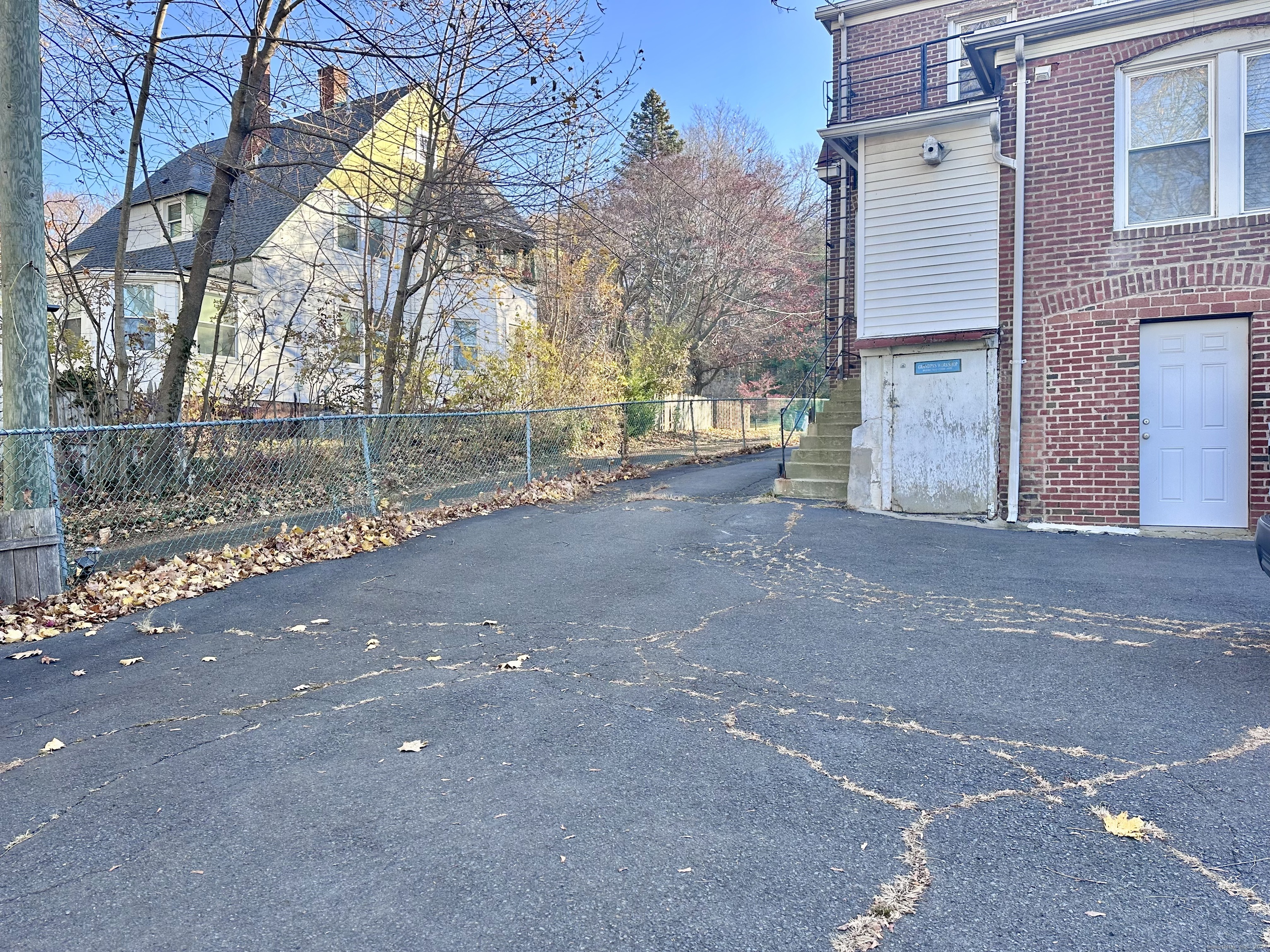 928 Townsend Avenue, Unit 1 New Haven, CT 06512 - Photo 18 of 19 a view of a house with a street