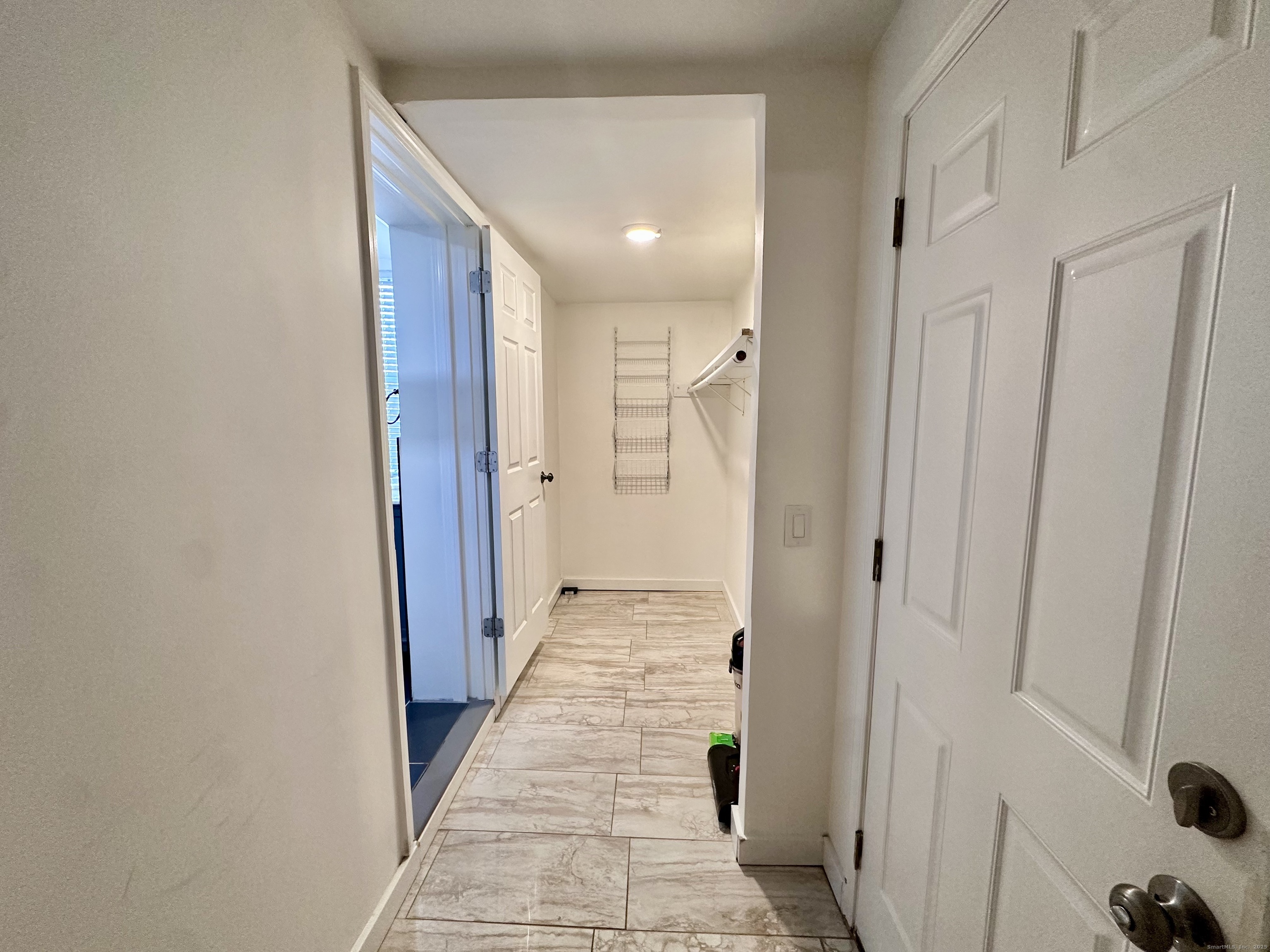 928 Townsend Avenue, Unit 1 New Haven, CT 06512 - Photo 6 of 19 a view of a hallway