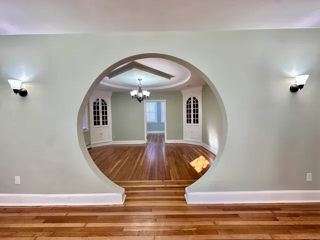 a view of entryway with wooden floor