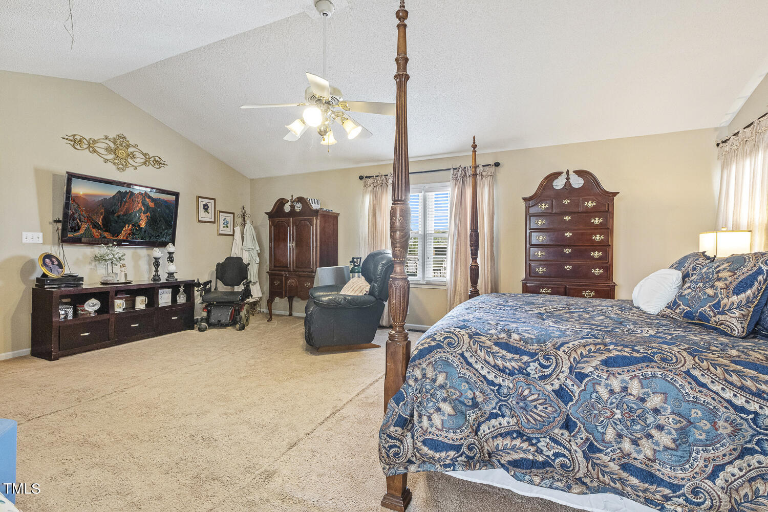 195 Williams Road Coats, NC 27521 - Photo 27 of 100 a bedroom with a bed a couch and dresser