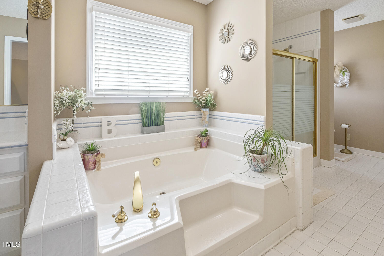 195 Williams Road Coats, NC 27521 - Photo 29 of 100 a bath tub sitting in a bathroom next to a tub