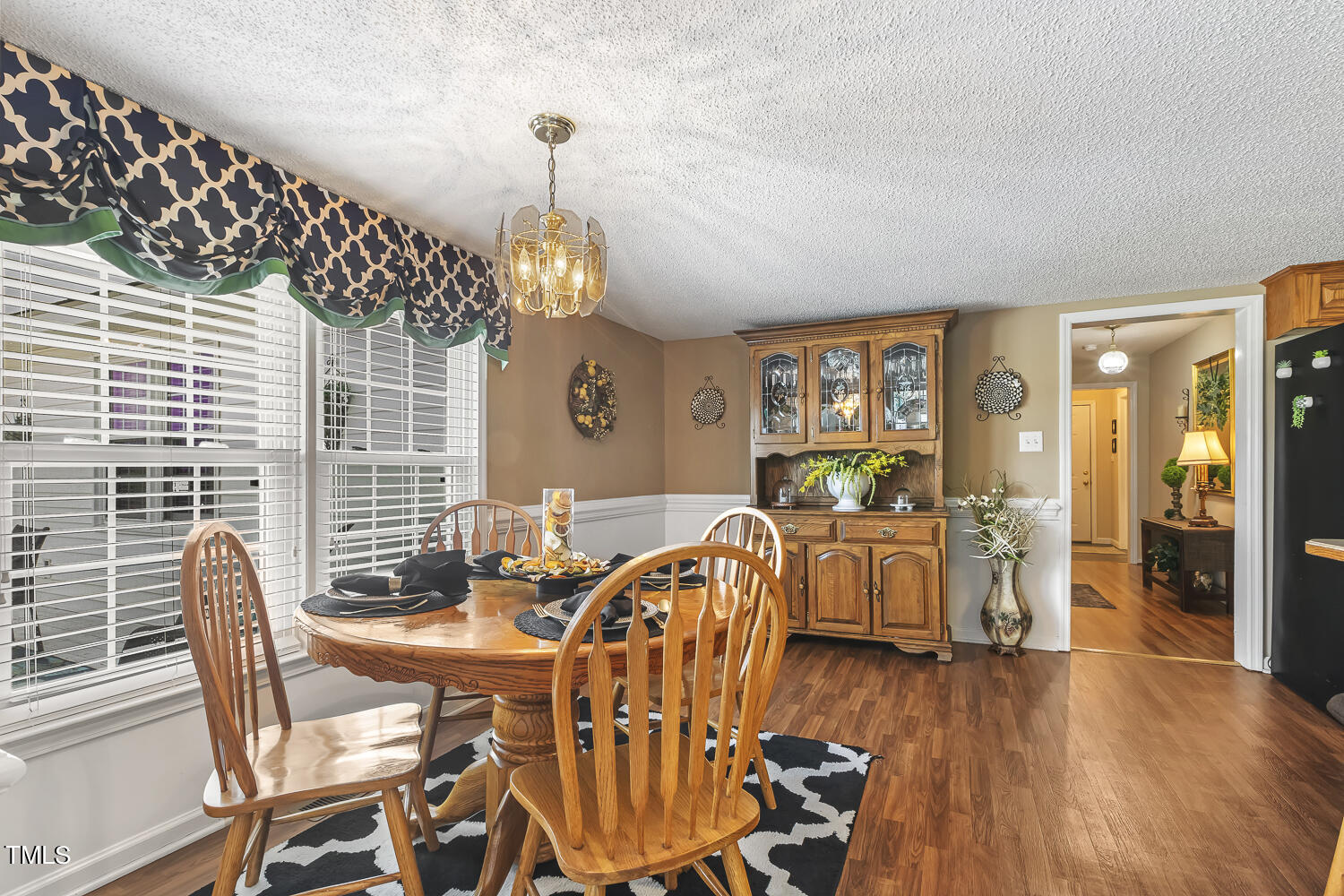 195 Williams Road Coats, NC 27521 - Photo 40 of 100 a view of a dining room with furniture window and wooden floor