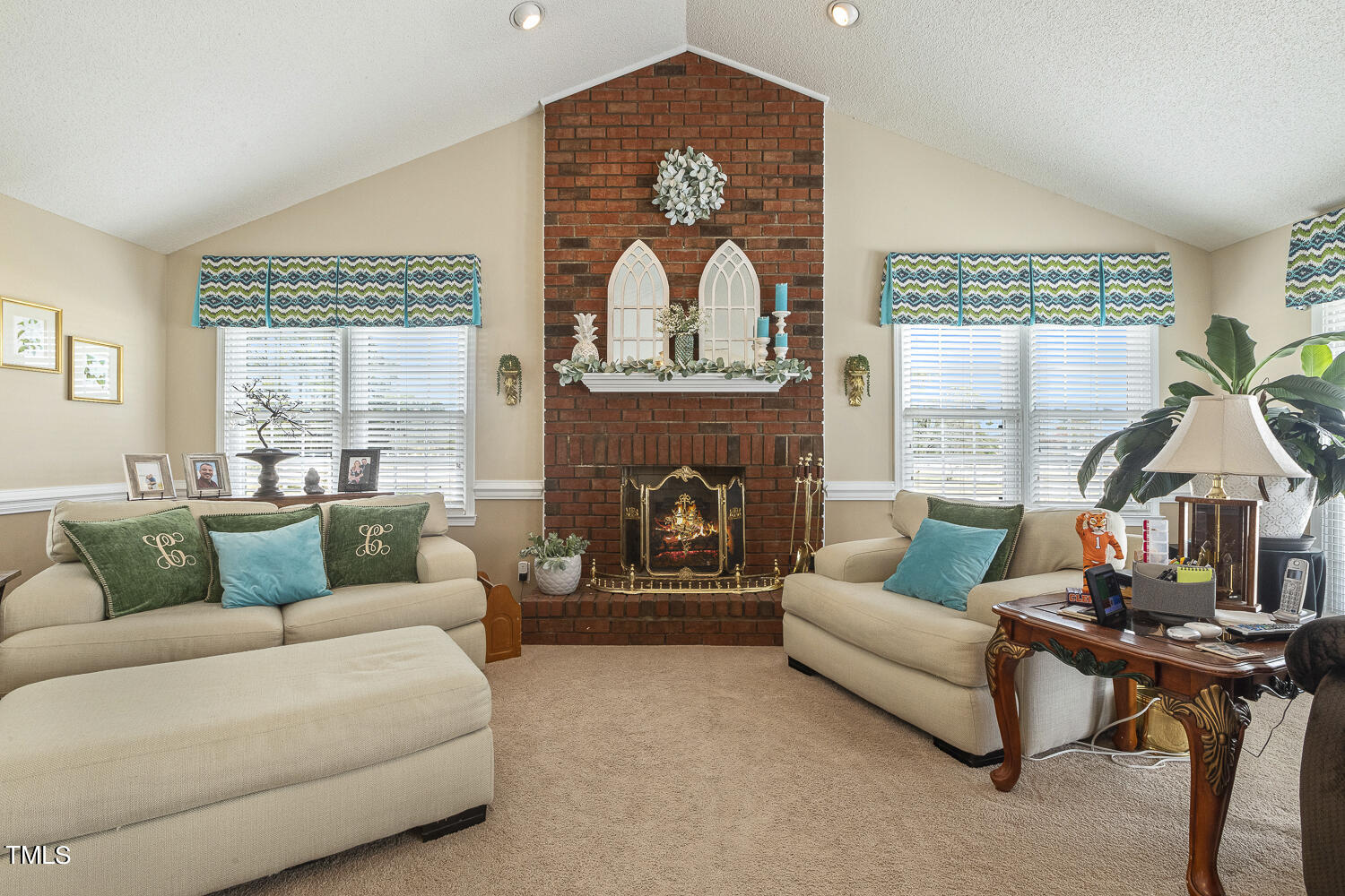 195 Williams Road Coats, NC 27521 - Photo 44 of 100 a living room with furniture and a fireplace