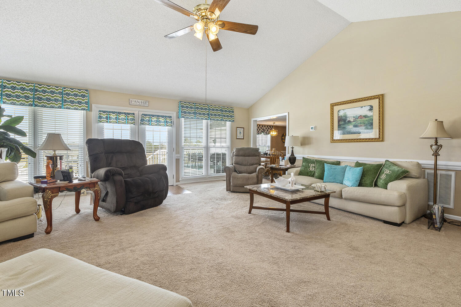 195 Williams Road Coats, NC 27521 - Photo 46 of 100 a living room with furniture and a large window