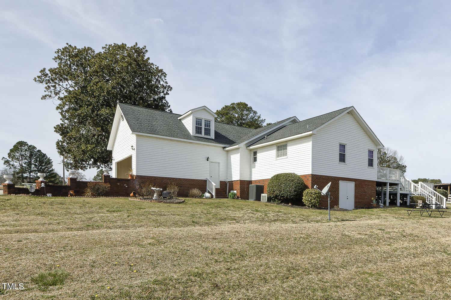 195 Williams Road Coats, NC 27521 - Photo 67 of 100 a front view of a house with a yard