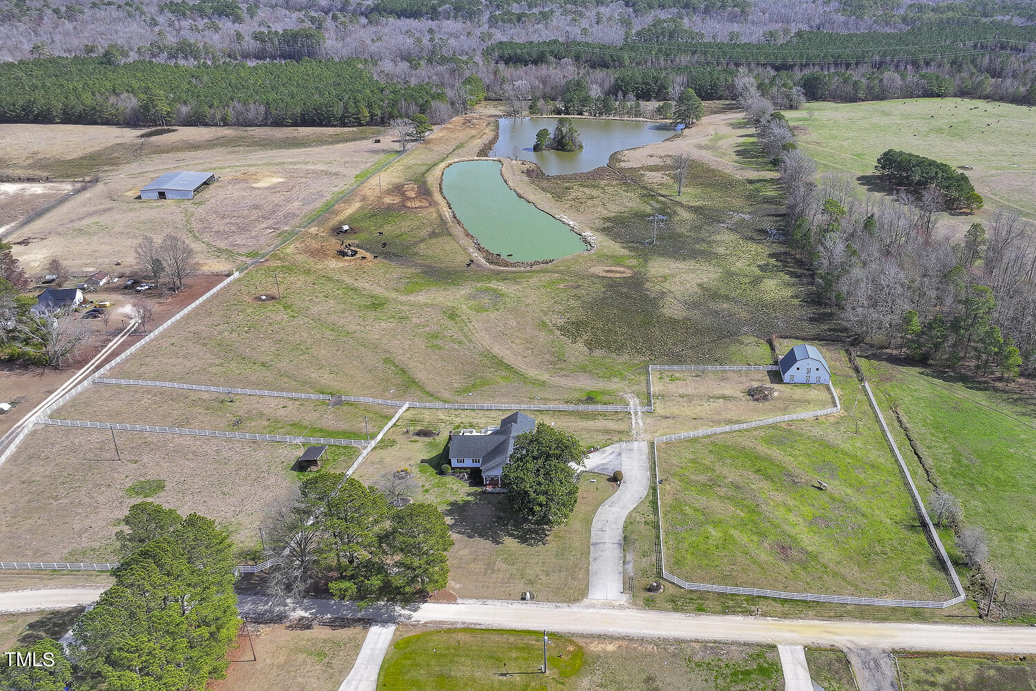 195 Williams Road Coats, NC 27521 - Photo 70 of 100 an aerial view of a house with a yard and lake view