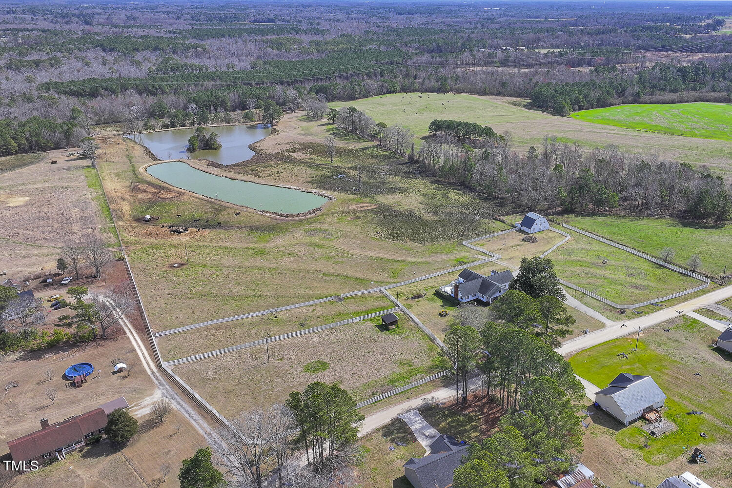 195 Williams Road Coats, NC 27521 - Photo 71 of 100 an aerial view of a house with a yard basket ball court and outdoor seating