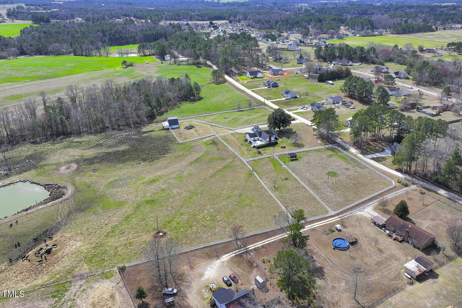 195 Williams Road Coats, NC 27521 - Photo 76 of 100 an aerial view of a house with a yard