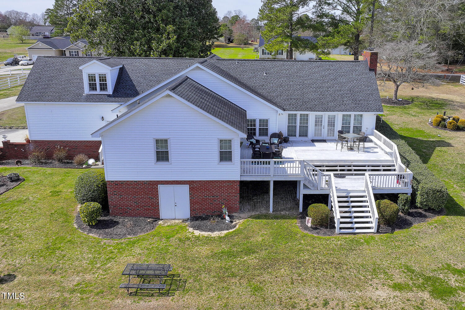 195 Williams Road Coats, NC 27521 - Photo 86 of 100 a view of a house with a yard and roof