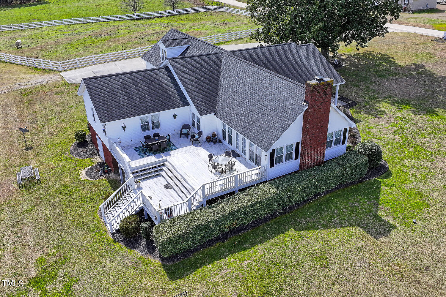 195 Williams Road Coats, NC 27521 - Photo 88 of 100 an aerial view of a house with a yard