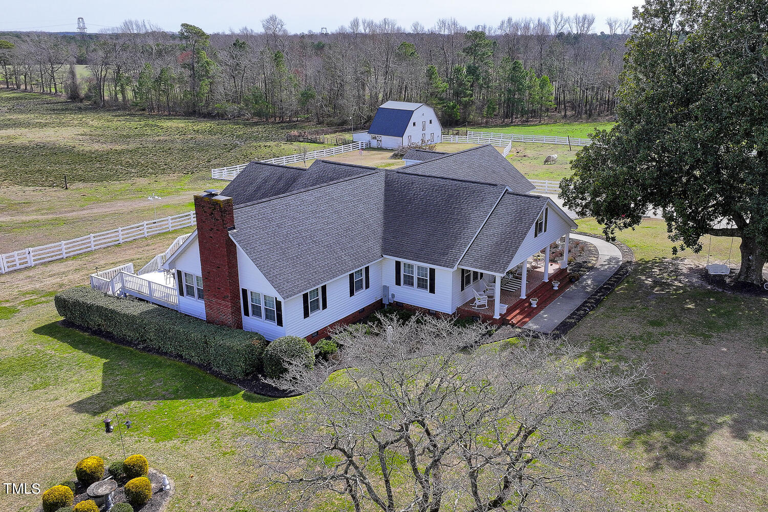 195 Williams Road Coats, NC 27521 - Photo 89 of 100 a view of a house with a yard and sitting area