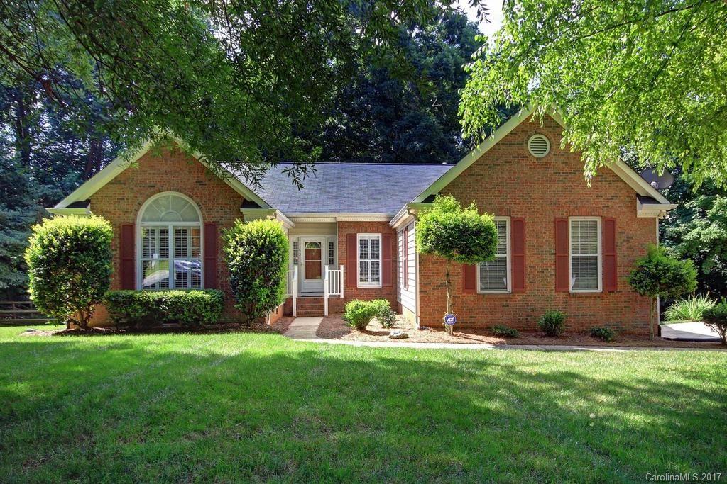 153 Kilborne Road Mooresville, NC 28117 - Photo 1 of 24 a front view of a house with garden