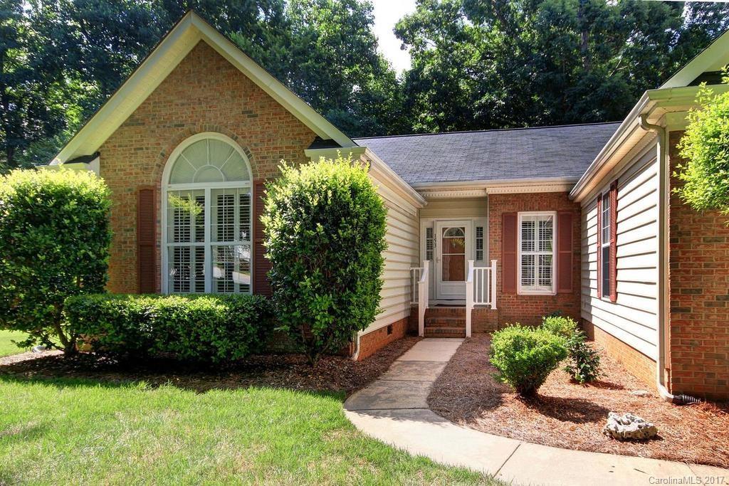 153 Kilborne Road Mooresville, NC 28117 - Photo 2 of 24 a front view of a house with garden
