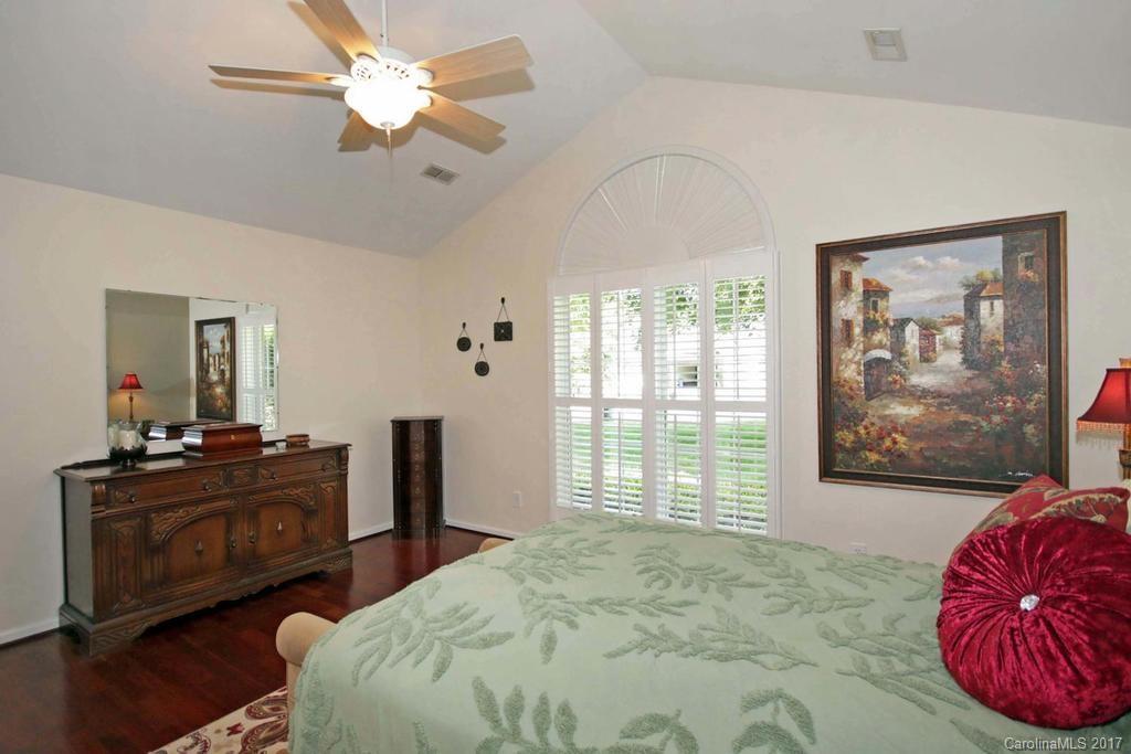 153 Kilborne Road Mooresville, NC 28117 - Photo 12 of 24 a bedroom with a bed dresser and window