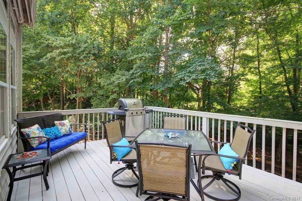 153 Kilborne Road Mooresville, NC 28117 - Photo 20 of 24 a view of a chair and table on the deck