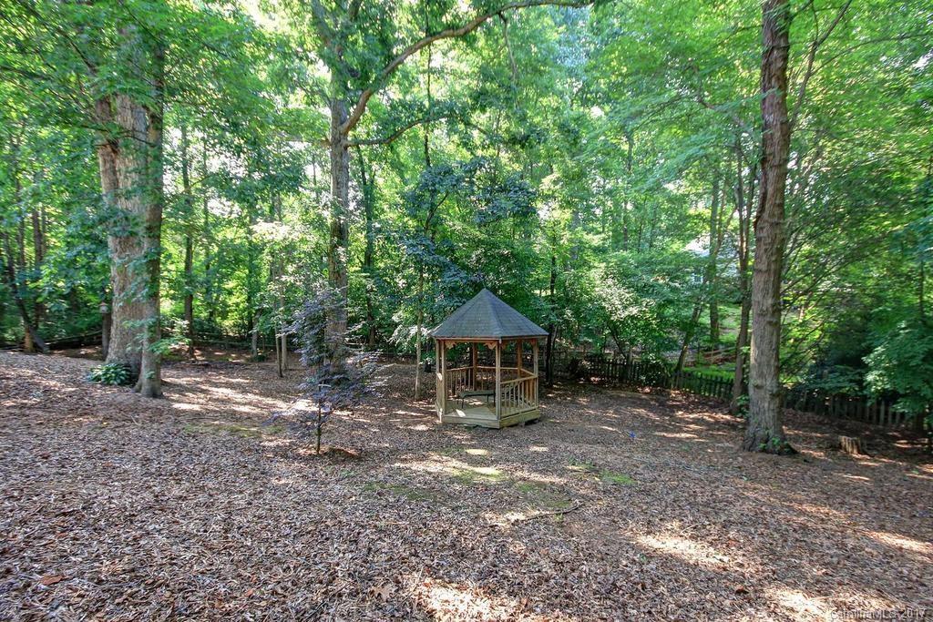 153 Kilborne Road Mooresville, NC 28117 - Photo 24 of 24 a backyard of a house with seating space