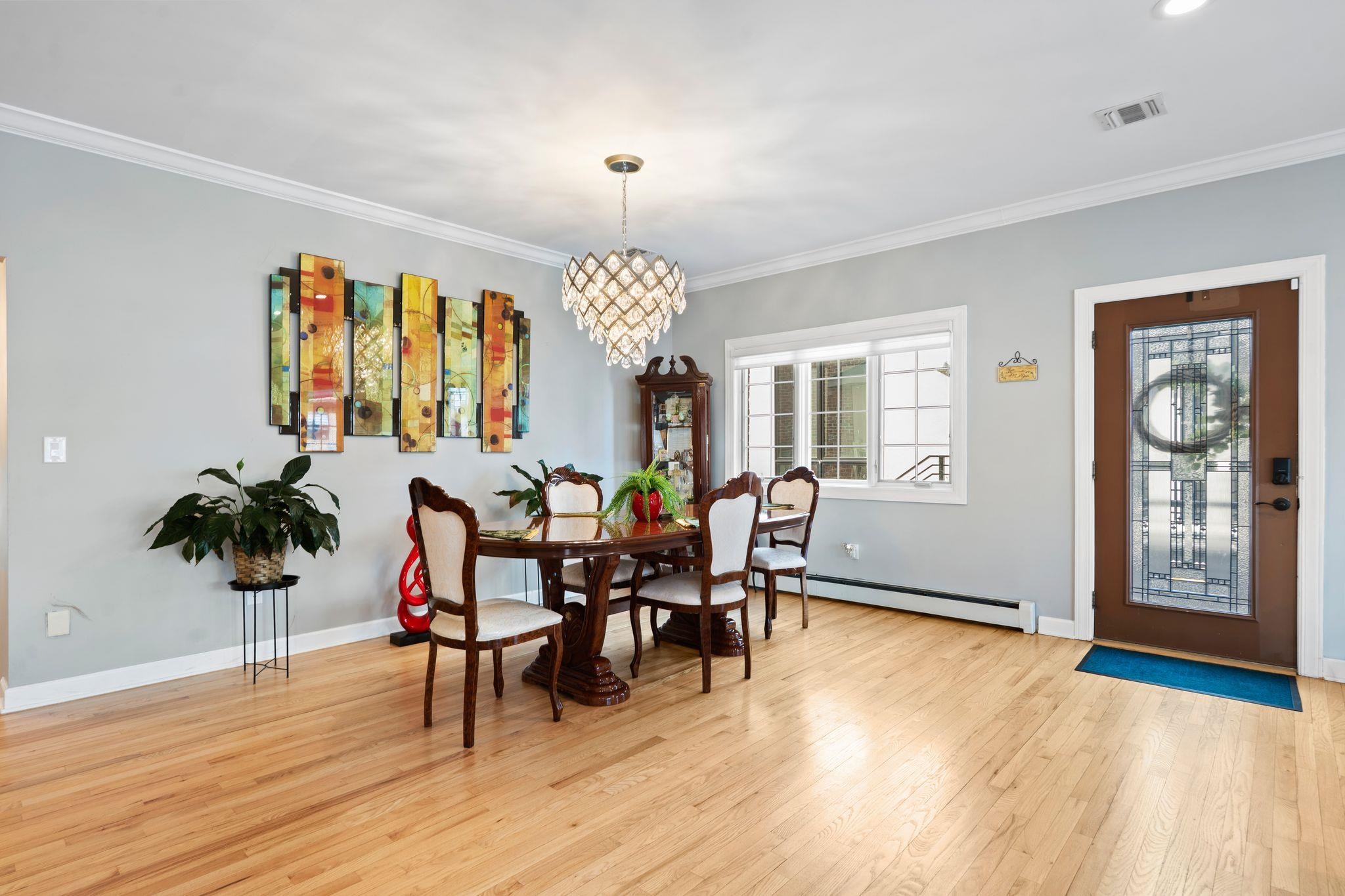 88 Myrtle Avenue, Unit B Edgewater, NJ 07020 - Photo 2 of 49 a view of a dining room with furniture window and wooden floor