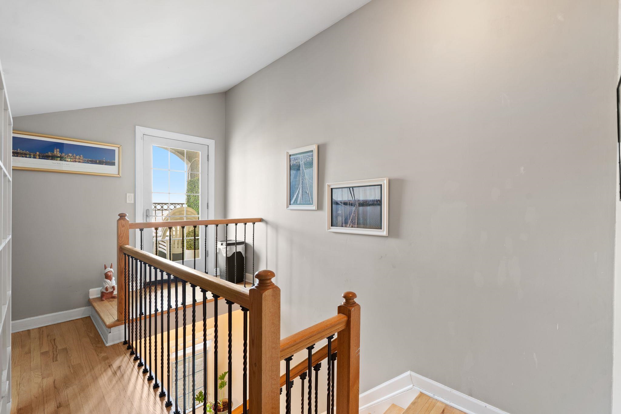 88 Myrtle Avenue, Unit B Edgewater, NJ 07020 - Photo 24 of 49 a view of a hallway with wooden floor and windows