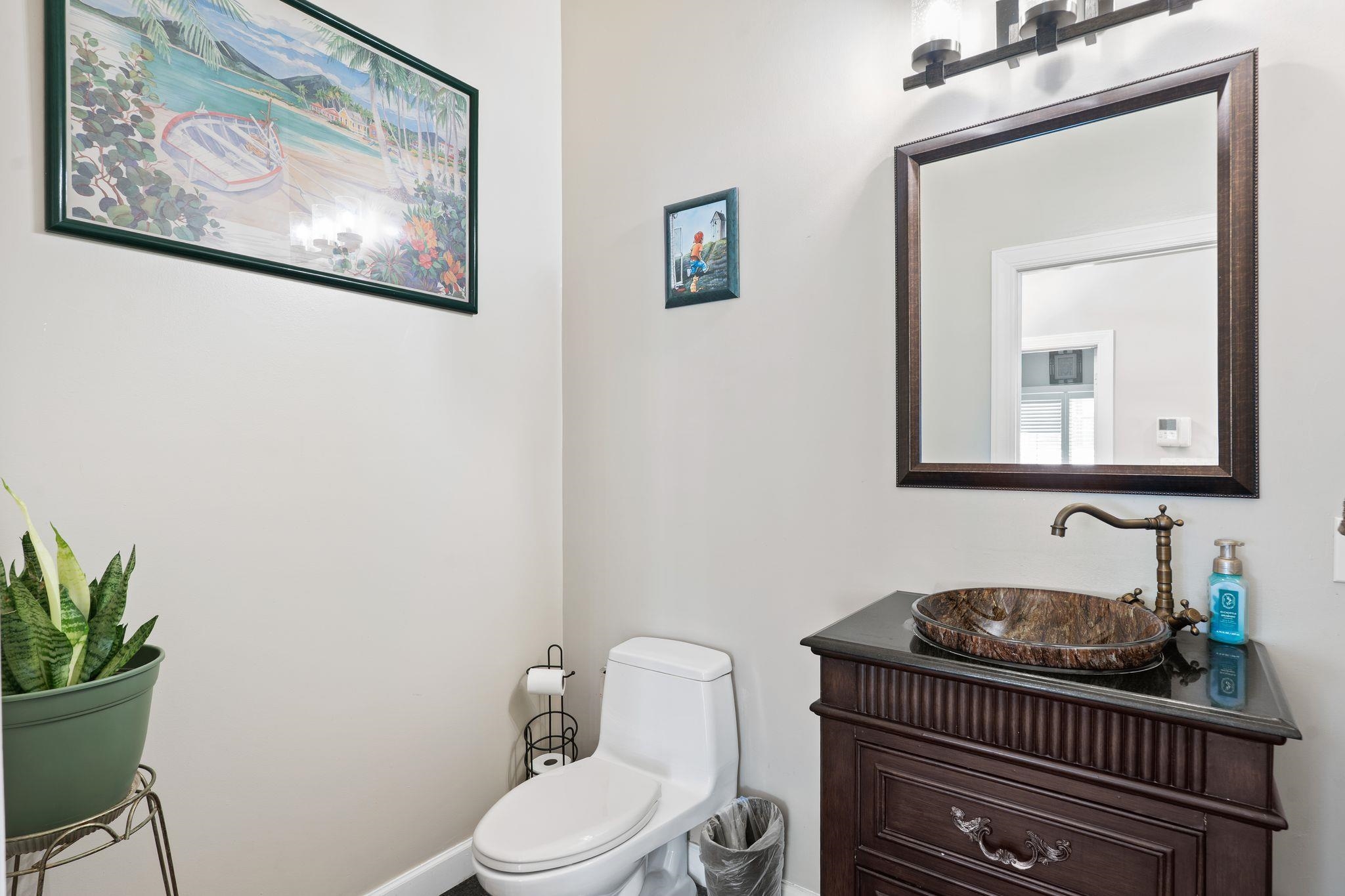 88 Myrtle Avenue, Unit B Edgewater, NJ 07020 - Photo 34 of 49 a bathroom with a toilet a sink and mirror