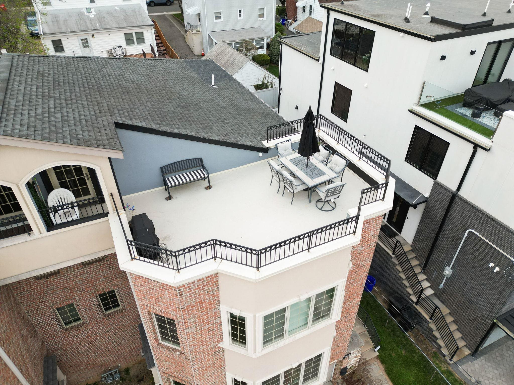 88 Myrtle Avenue, Unit B Edgewater, NJ 07020 - Photo 47 of 49 a view of a balcony with chairs