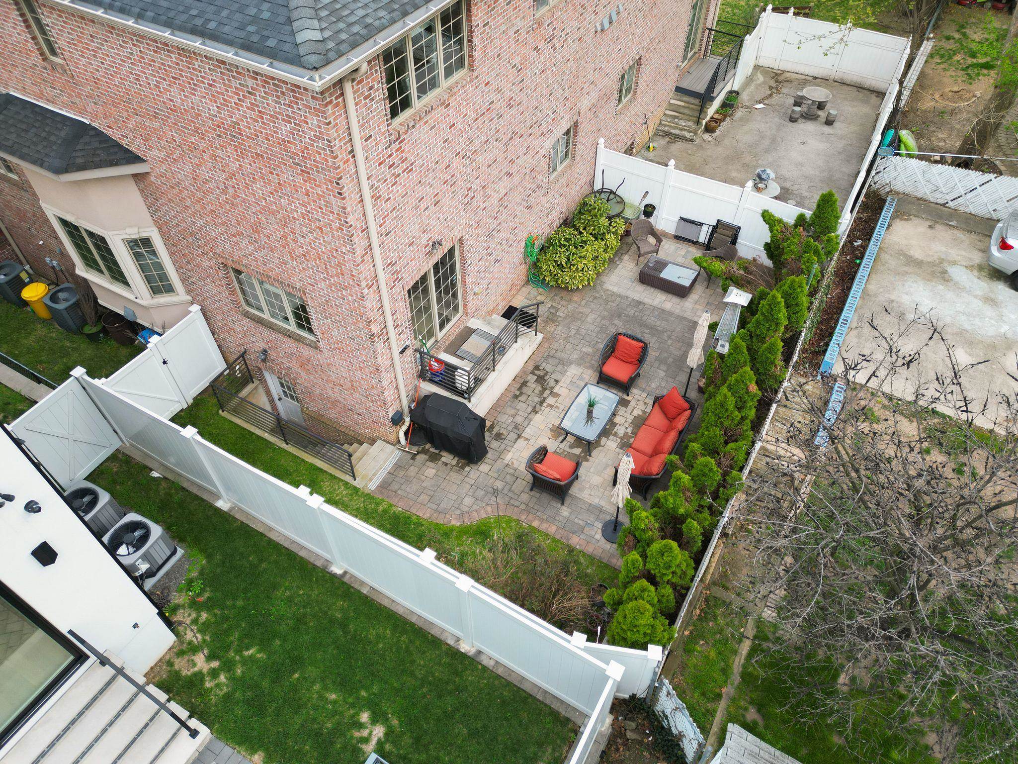 88 Myrtle Avenue, Unit B Edgewater, NJ 07020 - Photo 48 of 49 an aerial view of a house with a yard