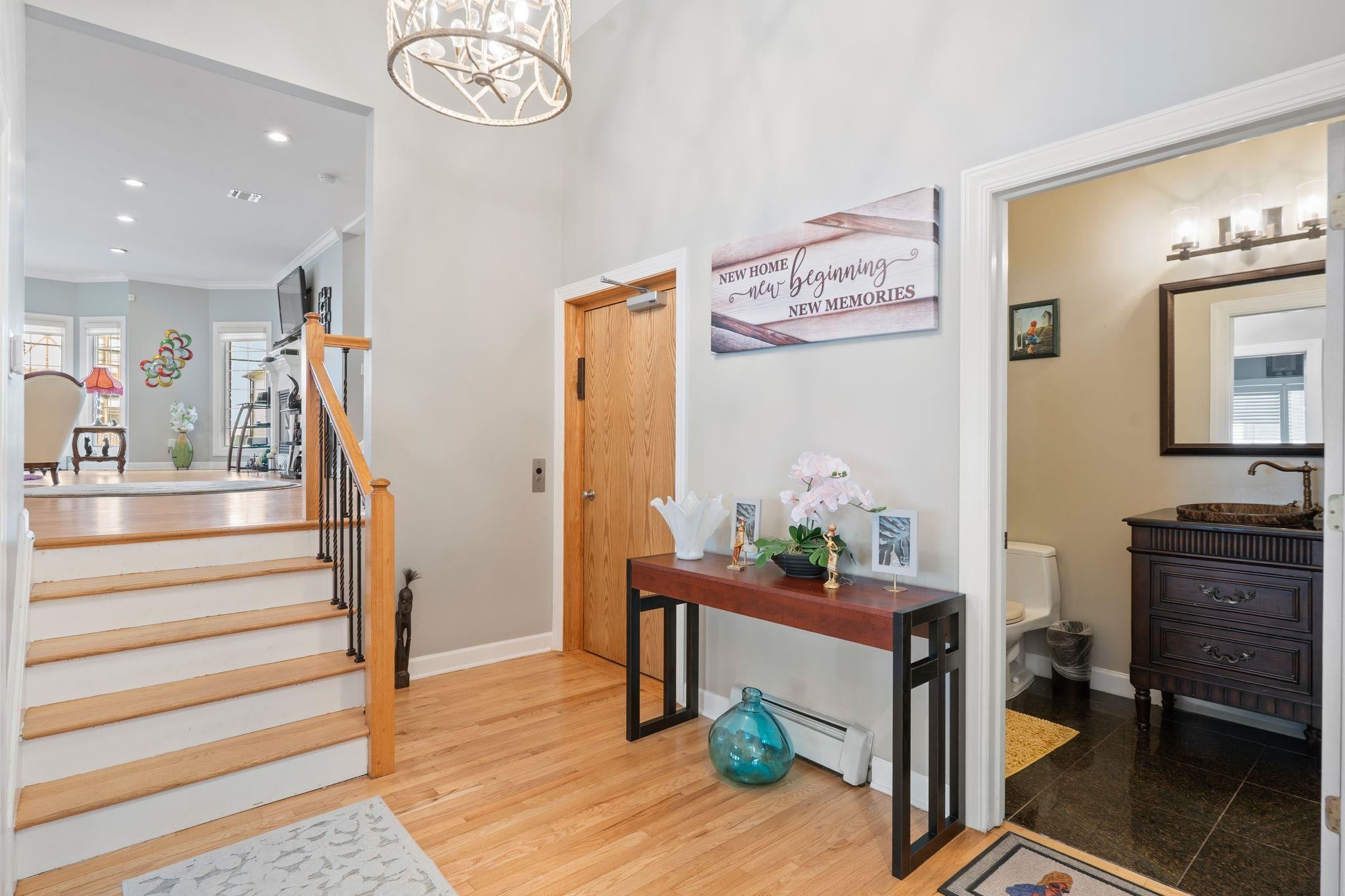 88 Myrtle Avenue, Unit B Edgewater, NJ 07020 - Photo 5 of 49 a living room with furniture and a wooden floor