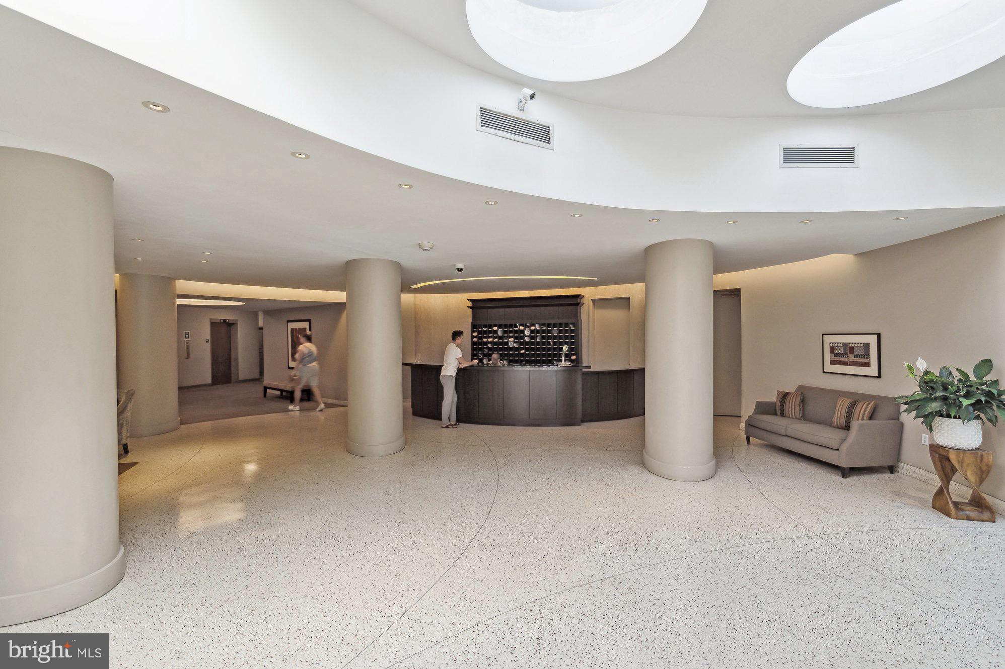 4101 Cathedral Avenue Northwest, Unit 306 Washington, DC 20016 - Photo 24 of 31 a view of a livingroom with furniture and cabinet