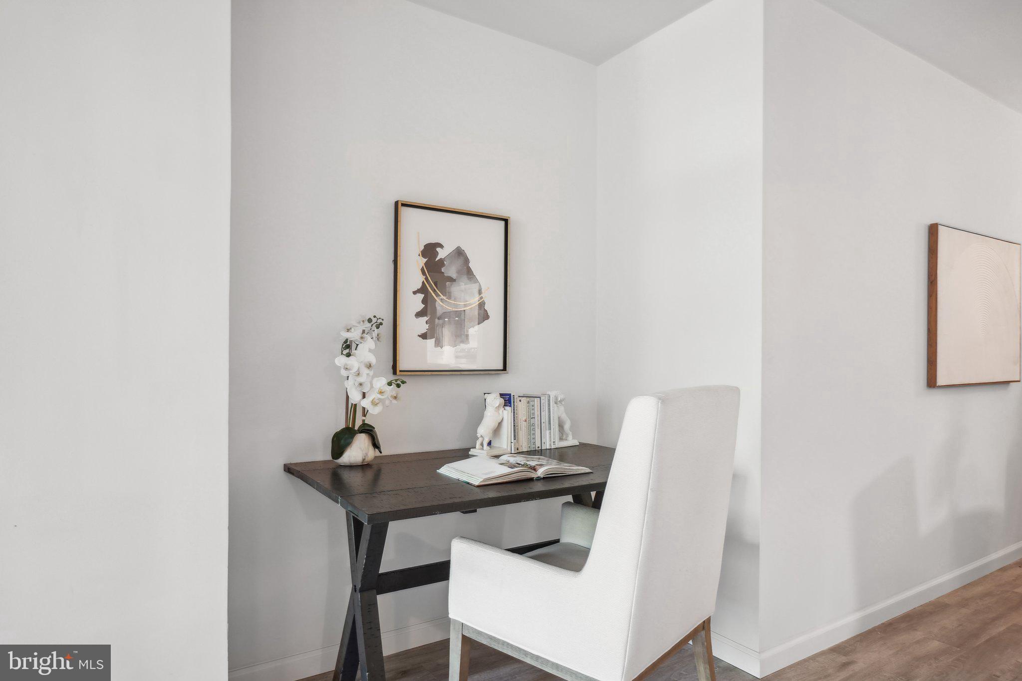 4101 Cathedral Avenue Northwest, Unit 306 Washington, DC 20016 - Photo 7 of 31 a view of a dining room with furniture and wooden floor