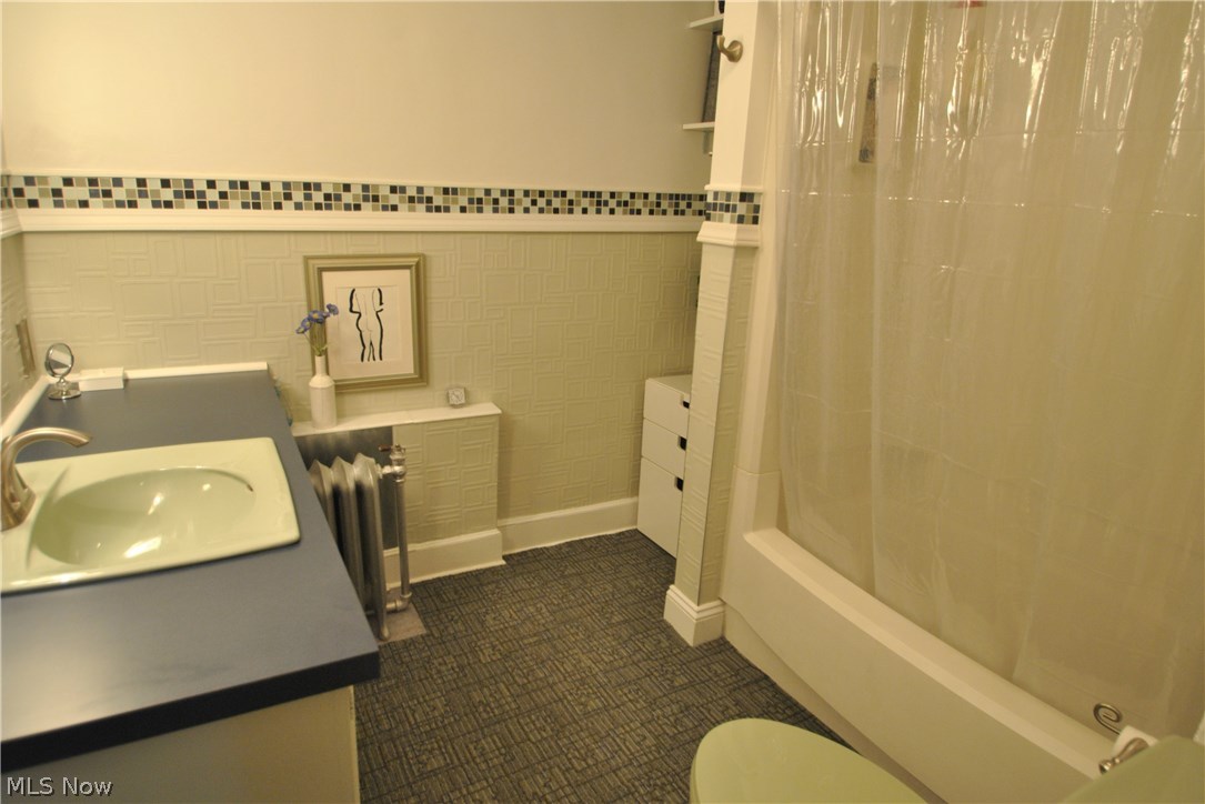2881 Bellaire Road Silver Lake, OH 44224 - Photo 23 of 29 Glass tiles add a modern touch to the third full bath.