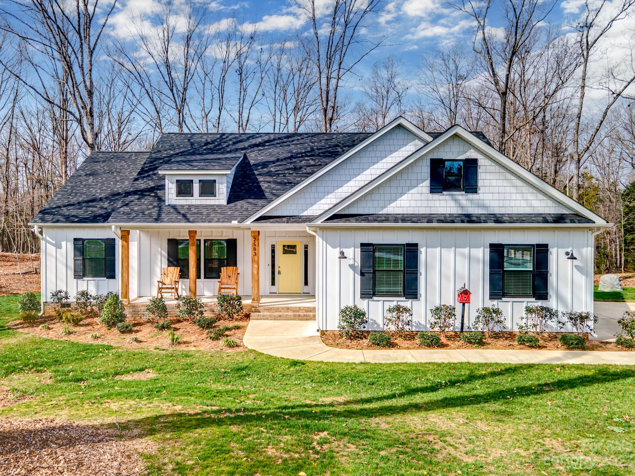 2583 Craig Farm Road Lancaster, SC 29720 - Photo 1 of 1 a front view of a house with swimming pool and chairs