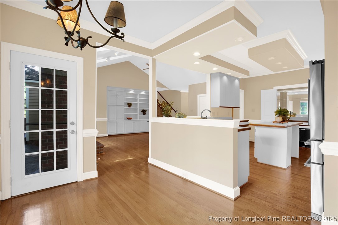 453 Kingsford Road Fayetteville, NC 28314 - Photo 17 of 50 a view of kitchen with cabinets and wooden floor
