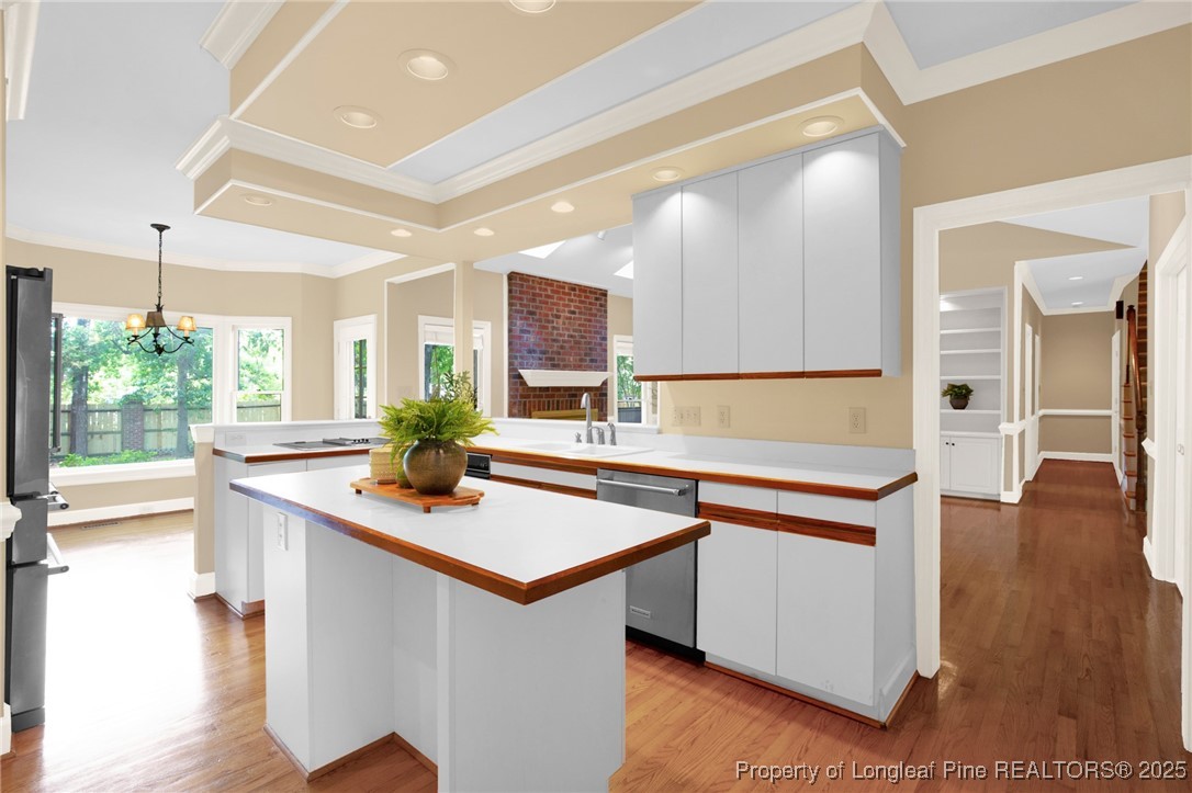 453 Kingsford Road Fayetteville, NC 28314 - Photo 21 of 50 a view of a kitchen from a dining room