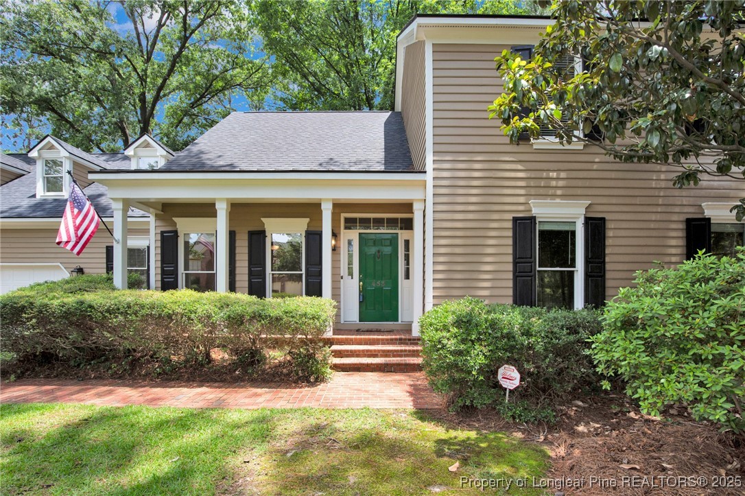 453 Kingsford Road Fayetteville, NC 28314 - Photo 3 of 50 a view of a house with a yard and plants
