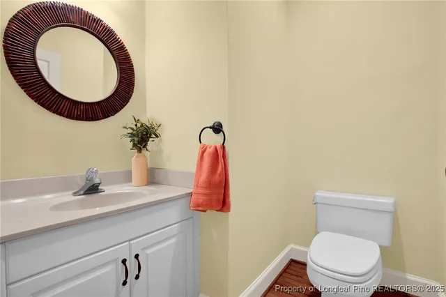 a bathroom with a toilet and a sink