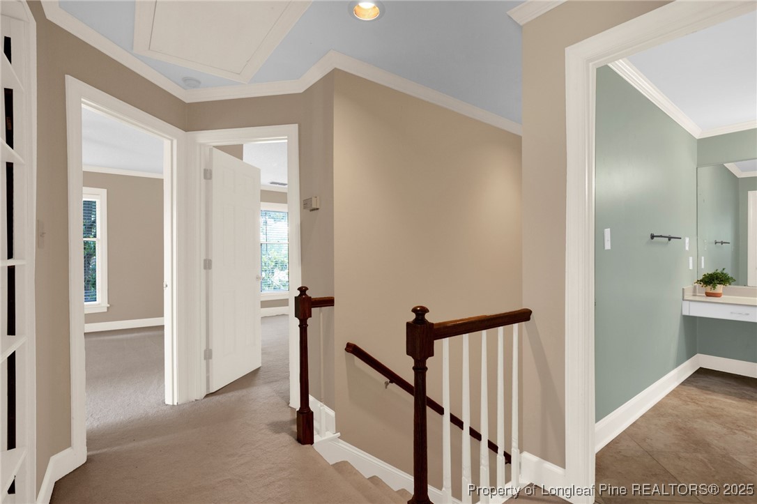 453 Kingsford Road Fayetteville, NC 28314 - Photo 38 of 50 a view of a hallway with a livingroom and stairs