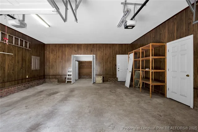 a view of an empty room with stairs