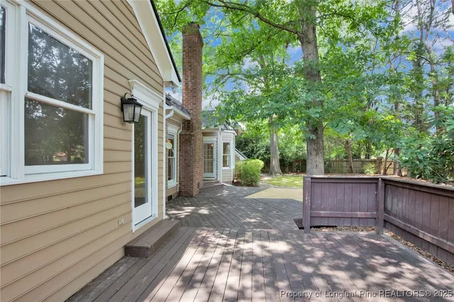 a view of a house with a back yard