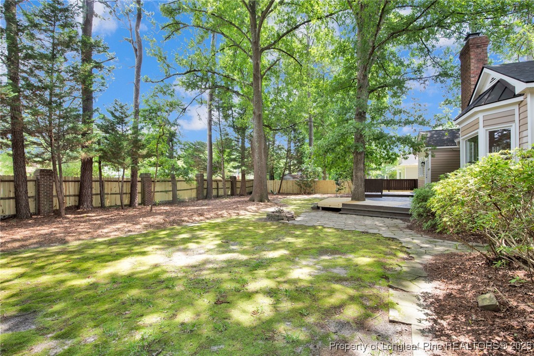 453 Kingsford Road Fayetteville, NC 28314 - Photo 44 of 50 a view of a house with a yard