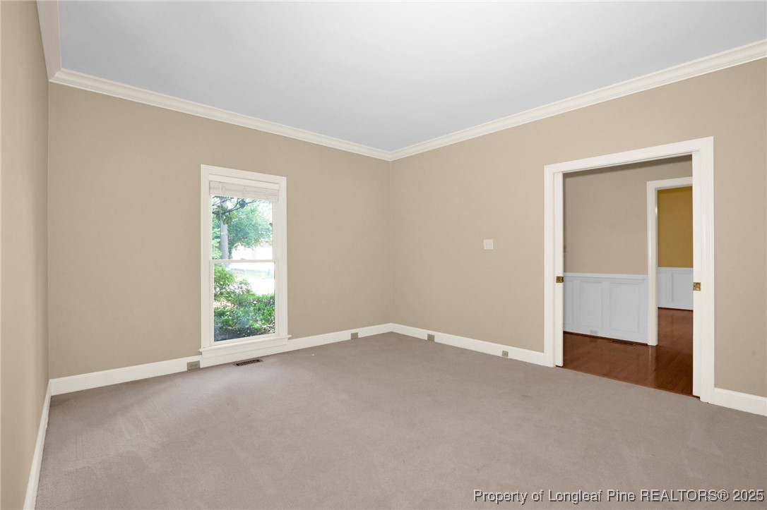 453 Kingsford Road Fayetteville, NC 28314 - Photo 6 of 50 a view of an empty room and window