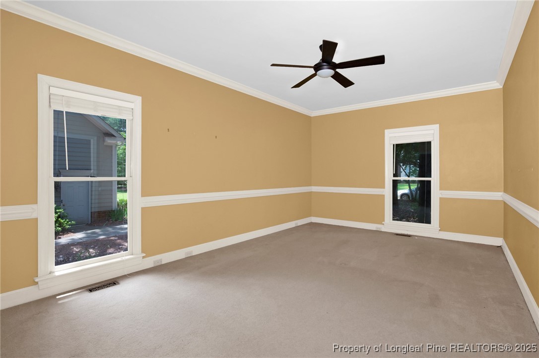 453 Kingsford Road Fayetteville, NC 28314 - Photo 7 of 50 a view of an empty room with a window