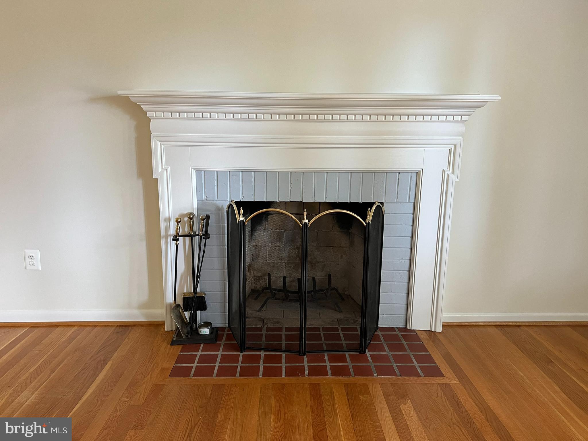 9117 Cherrytree Drive Alexandria, VA 22309 - Photo 15 of 38 Living room wood burning fire place