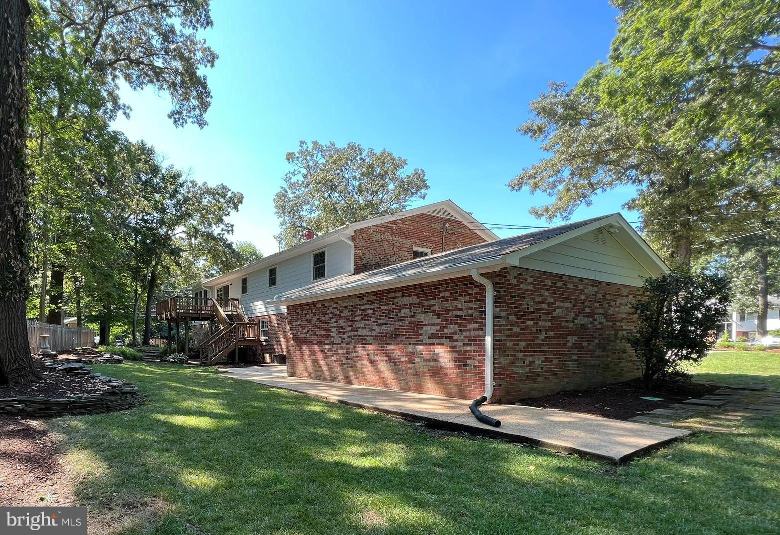 9117 Cherrytree Drive Alexandria, VA 22309 - Photo 36 of 38 Backyard view from garage side of house