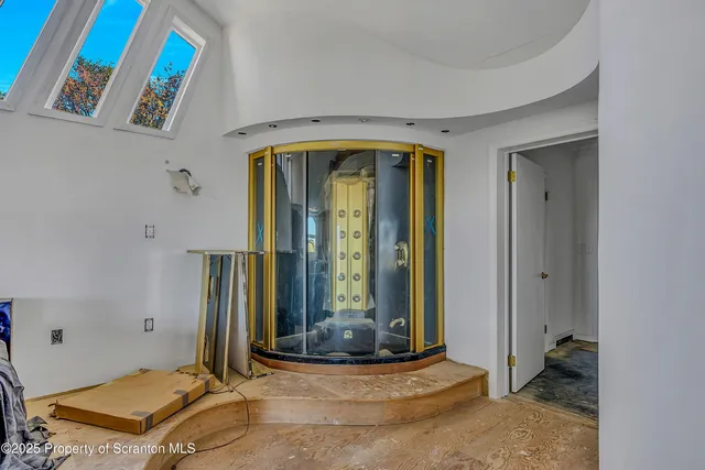 a kitchen that has a sink and a stove in it