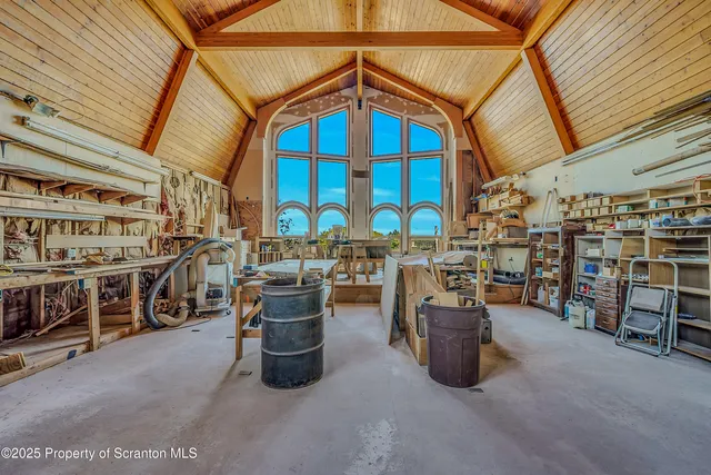 a view of a storage room with racks